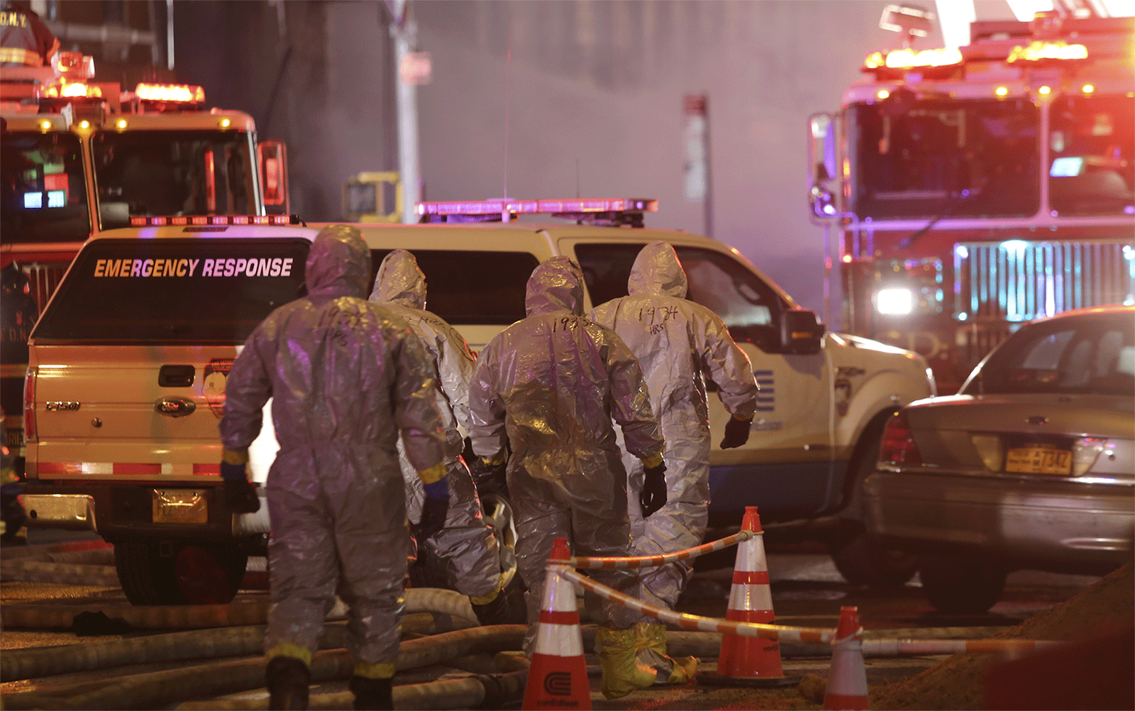 Image of a New York City street with fire engines and emergency personnel