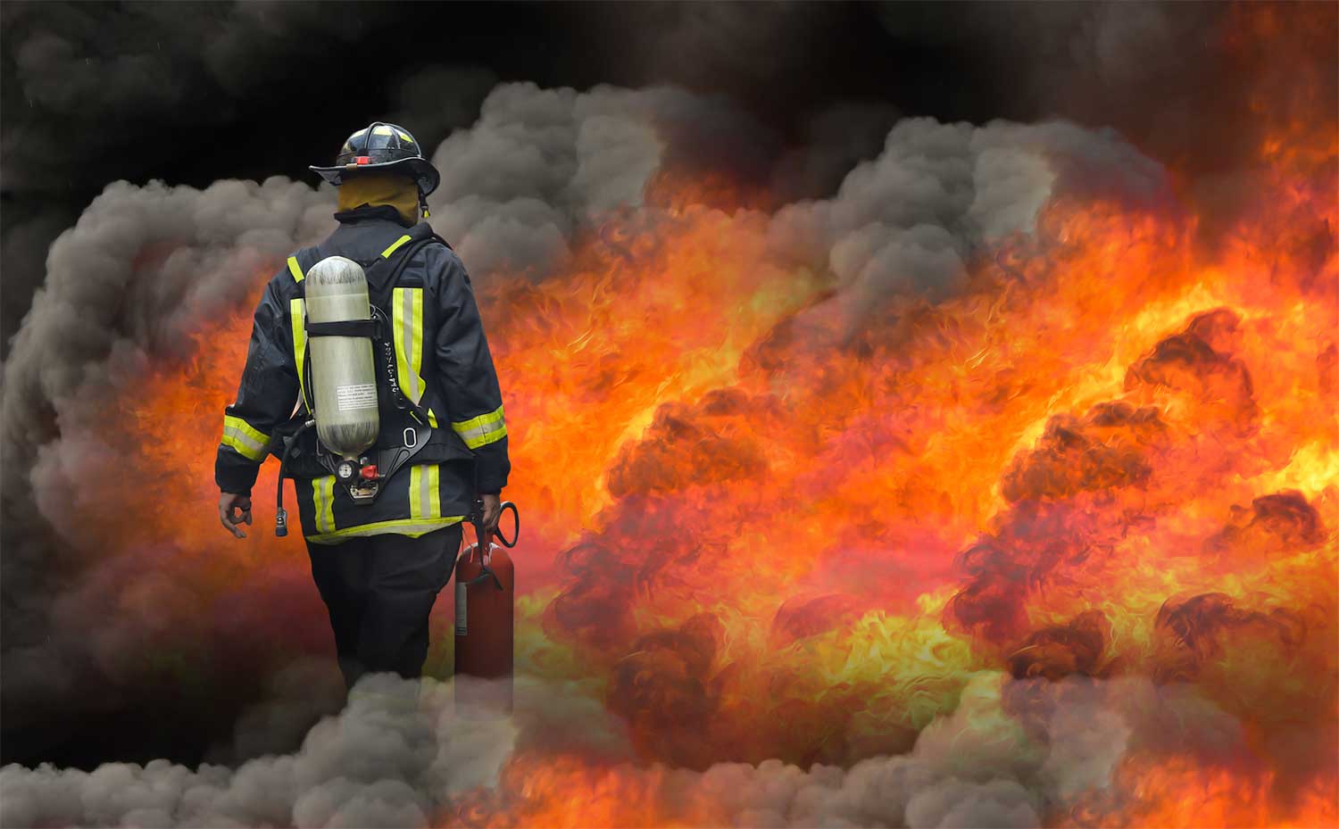 Image of a fire, firefighter and fire extinguisher